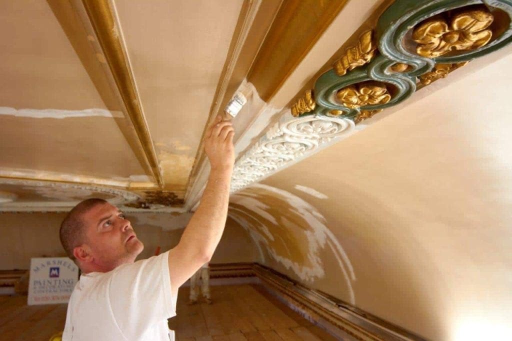 How to paint coving and cornice specialist painter refurbishing cornvice with a fresh coat of white paint