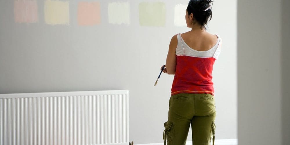 Painting and decorating room with a radiator
