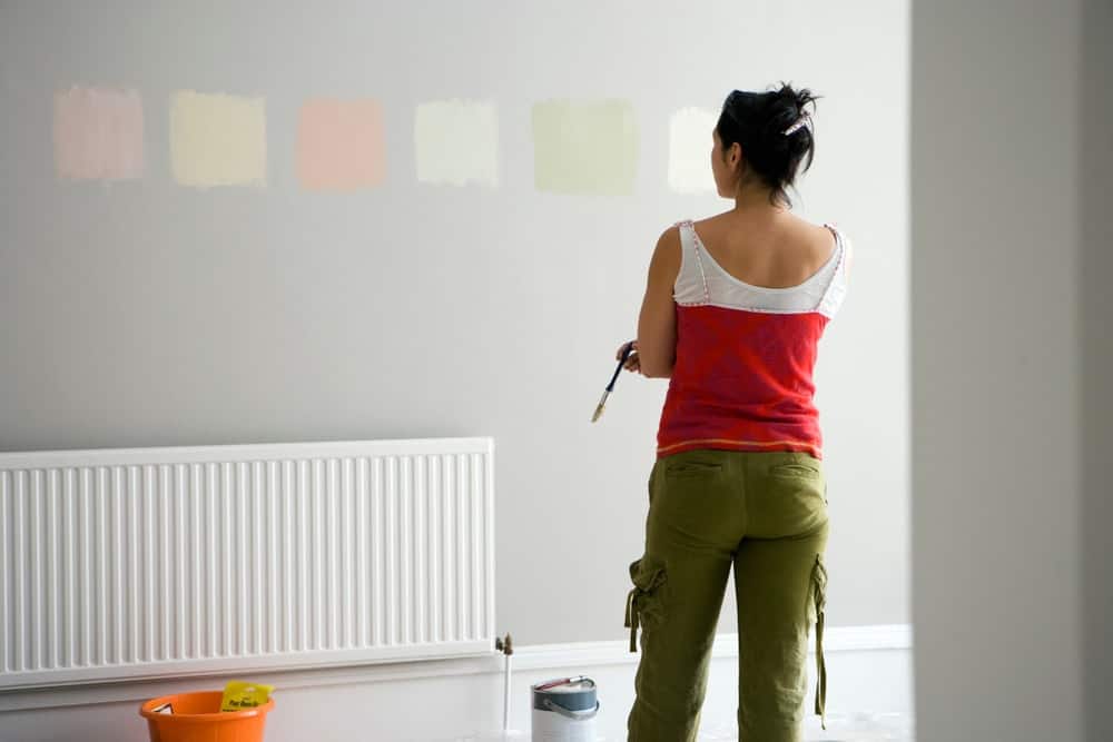 Painting and decorating room with a radiator