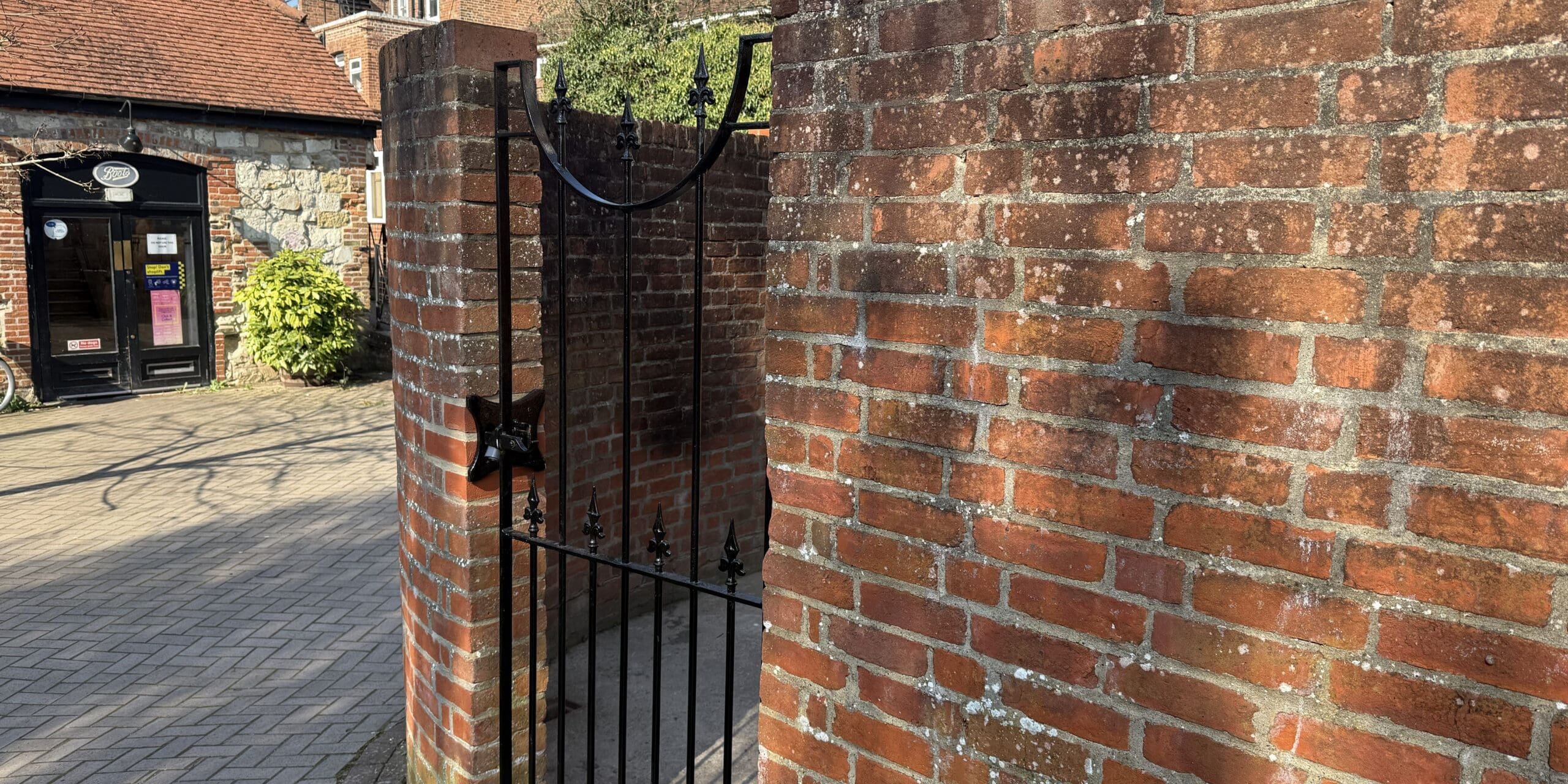 Restoring brickwork and repainting gate
