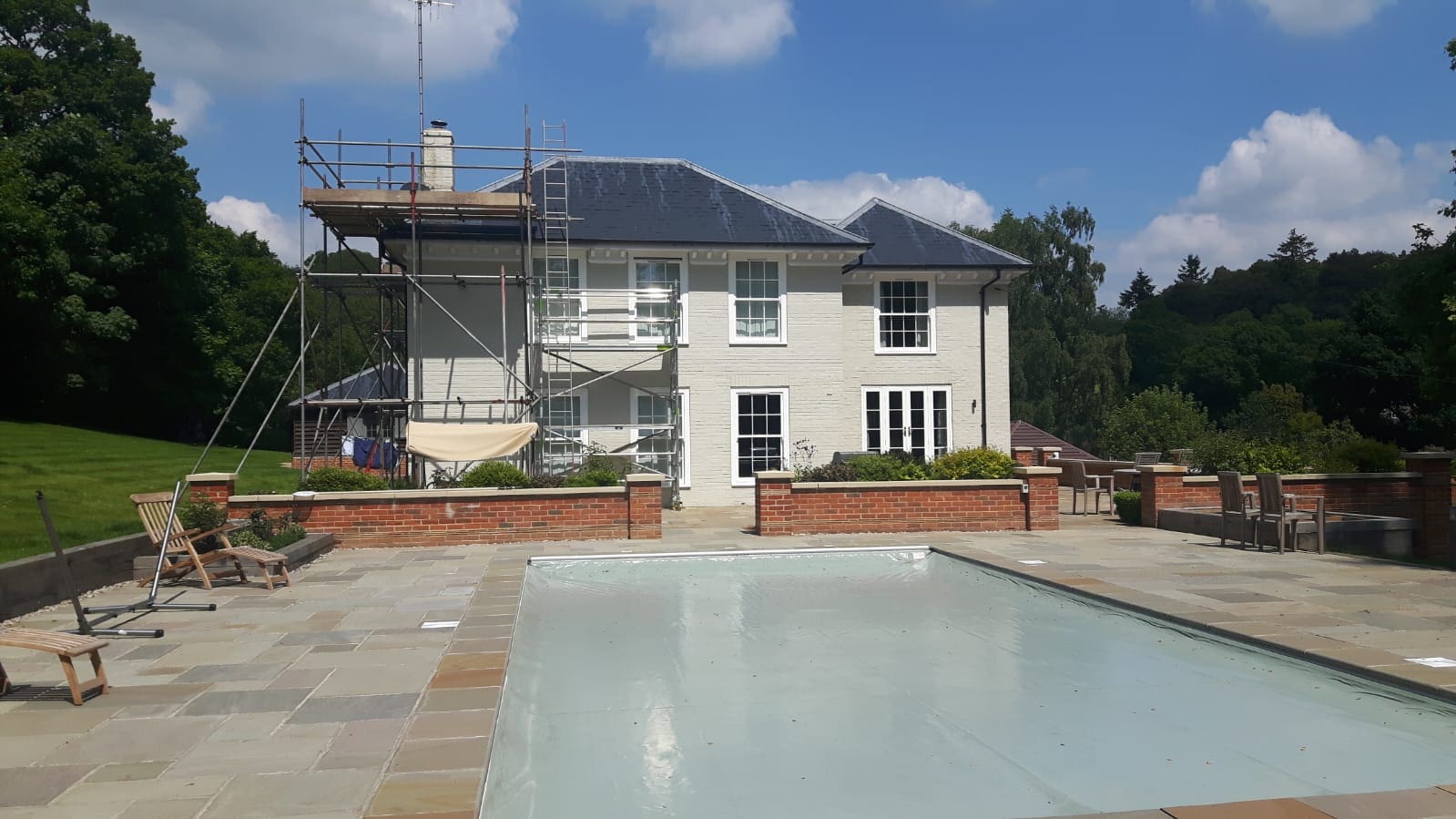 Painting exterior of country home